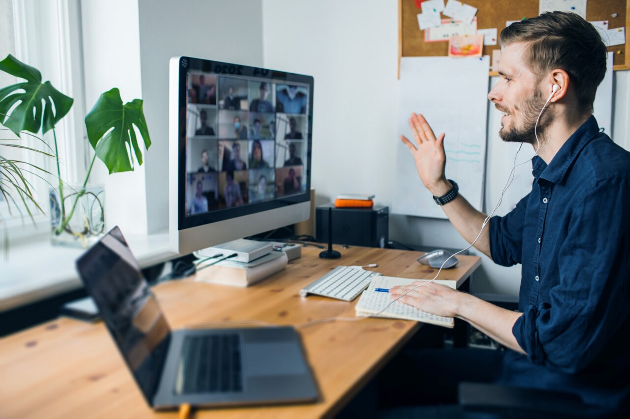 Businessman having a video conference at home office